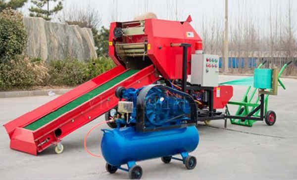 Full-automatic hay baler machine with film wrapper