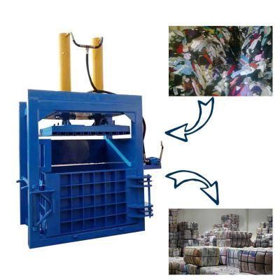 Double Stations Vertical Hydraulic Pet Bottle Pressing Machine Scrap Baler 100tons for Export